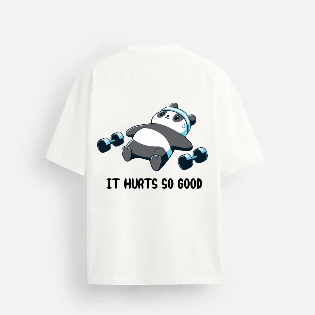 iWear It’s Hurts So Good oversized T-shirt in black, featuring bold white graphic text and a relaxed fit.