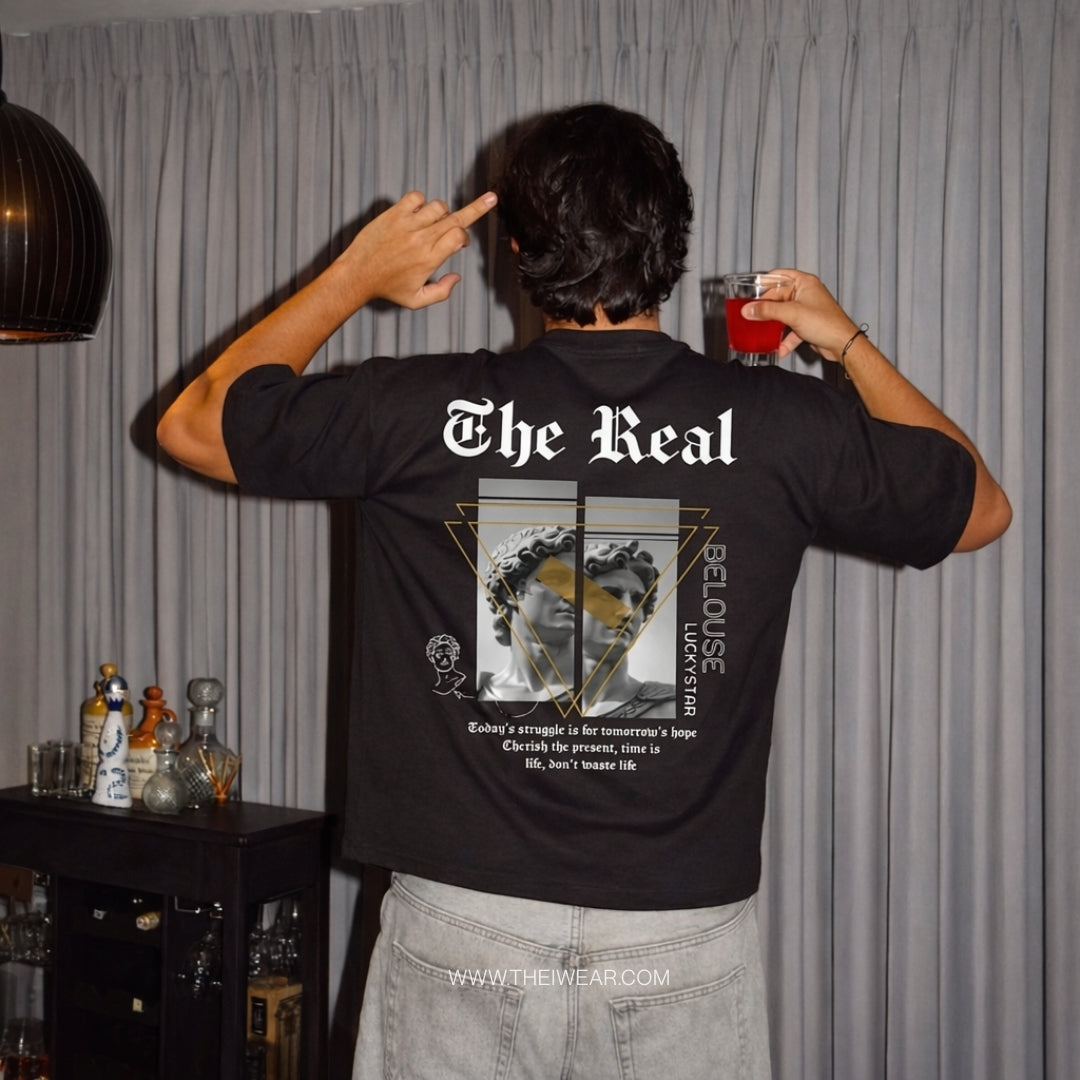Light gray drop shoulder T-shirt from theiwear's The Real collection, featuring a relaxed fit and soft fabric.