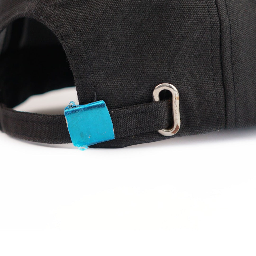 iWEAR Don't Do Topi, a casual black fabric cap with white text, displayed from a front angle.