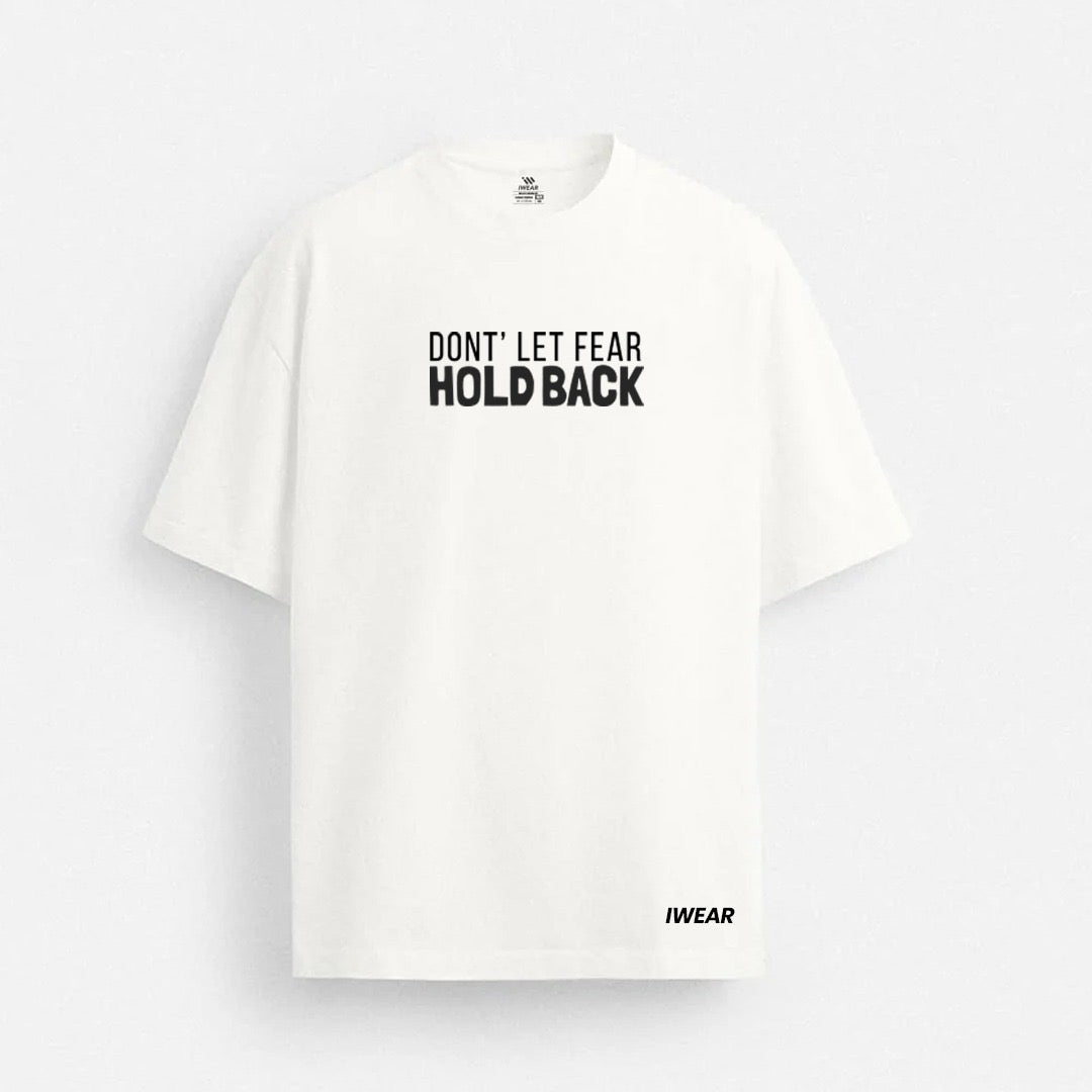 Black drop shoulder T-shirt from the theiwear "Don’t Let Fear Hold Back" collection, featuring bold text design.