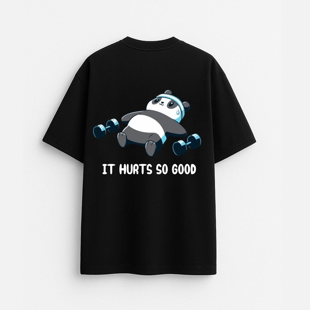 iWear oversized tee featuring bold "It’s Hurts So Good" graphic in black on a soft, comfortable fabric.